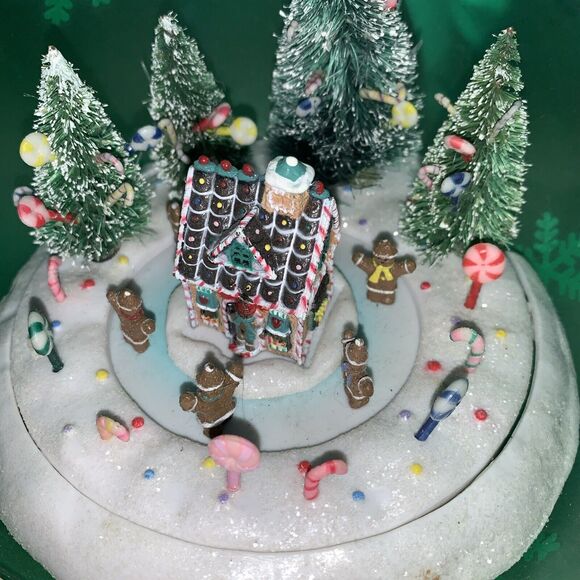 Animated Lighted Musical Ornament Plastic Gingerbread House Green Countertop - Picture 8 of 9